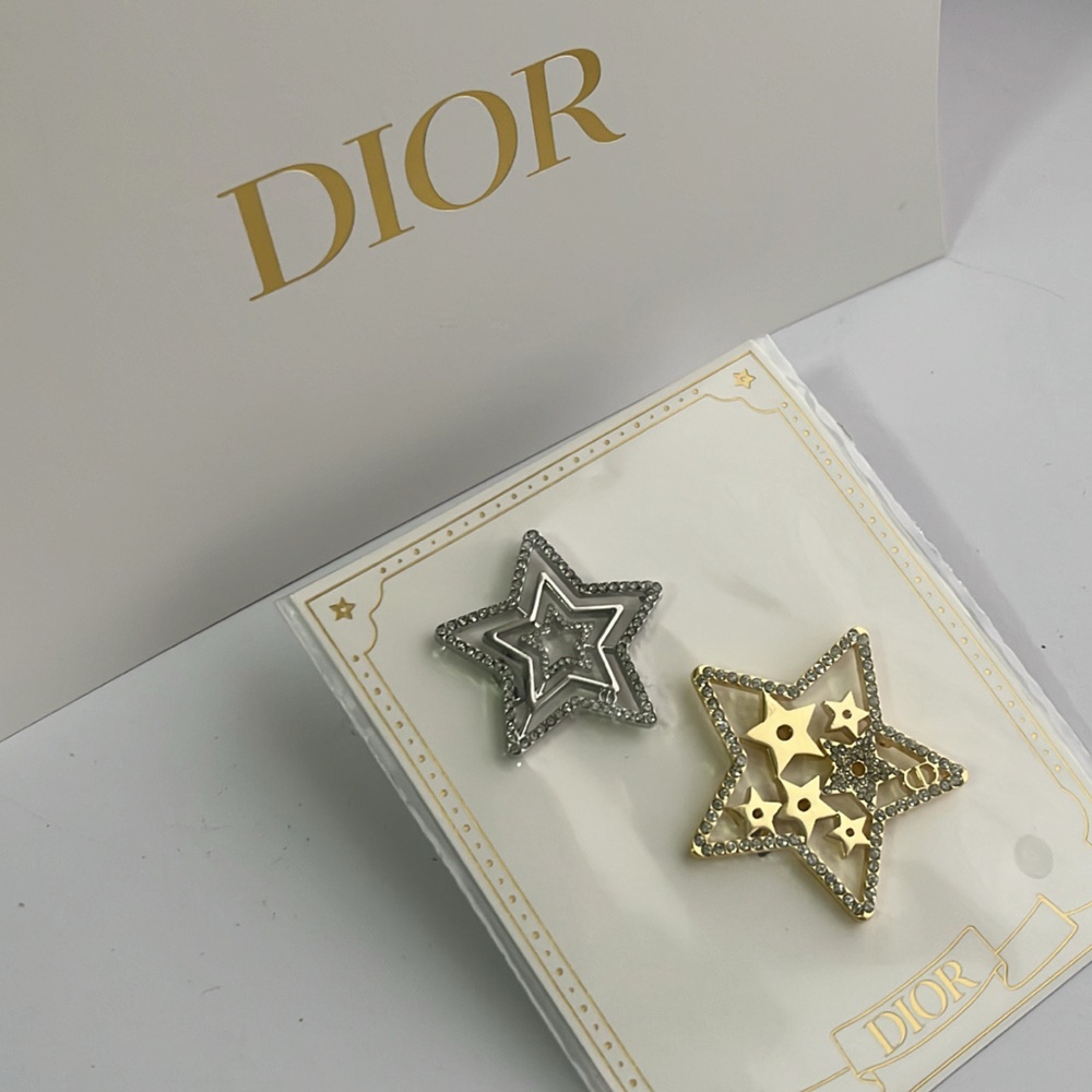 New and authentic Dior Silver and Gold Star Hair Clips
Limited edition. - Picture 3 of 9